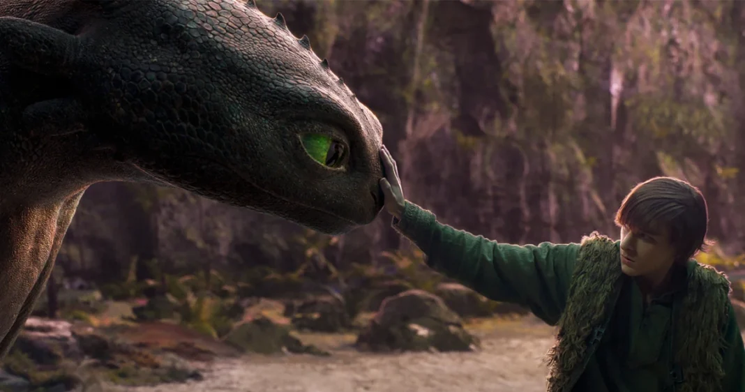 Live-action Hiccup and Toothless in a dramatic pose from the How to Train Your Dragon remake trailer
